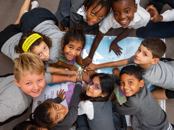 AKA Maputo students doing an assignment inside a classroom